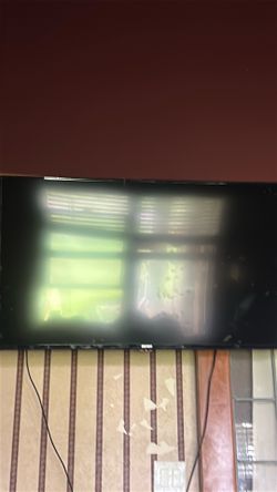 50-52” ELEMENT XUMO TV  AND SAMSUNG 30-35” TV WITH WALL MOUNTING BRACKETS