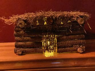 miniature wooden cabin