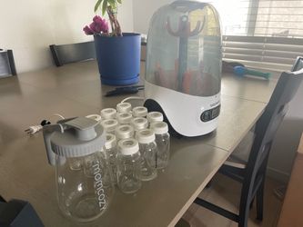 Baby Brezza One Step Baby Bottle Stream Sanitizer and Evenflo 15 set 4 ounce bottle set