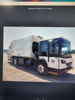 White Rear-Loader Garbage Truck