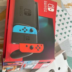 Brand New Nintendo Switch with box include 2 games and case in price