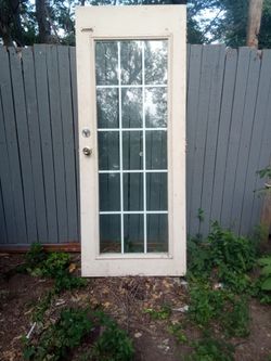 Wood entry door with glass center