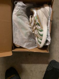 Puma inverse shimmer gold and matalic green