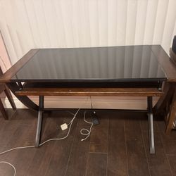 Black Glass top desk with wooden accents 