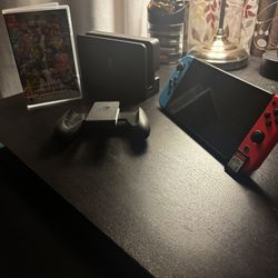 Nintendo Switch 4K OLED Red And Blue W/ Super Smash Bros Included