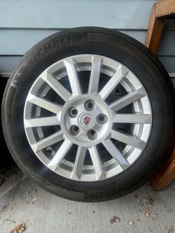 4 Cadillac rims and tires 5x120