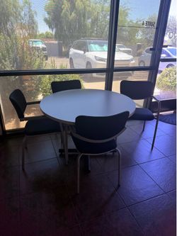 Small table with 4 chairs.