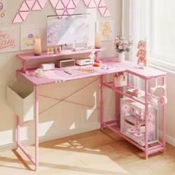 pink L shaped gaming desk