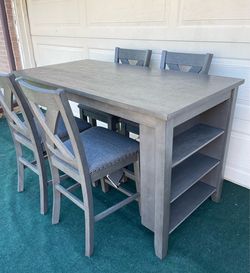 LIKE NEW 5-PC AESTHETIC HIGH TOP GRAY FINISH DINING SET (TABLE WITH SHELVES AND 4 PADDED CHAIRS)
