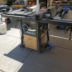 10 inch Delta table saw with side router attached