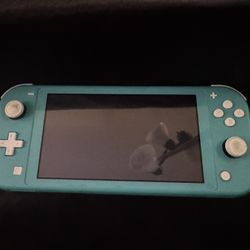 Nintendo Switch Lite (Turquoise) + Massive 256GB Expanded Storage & Games