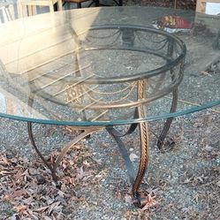 60 Inch Glass Top Table With Metal Base And 4 Chairs Located In Southmont NC $150 OBO 