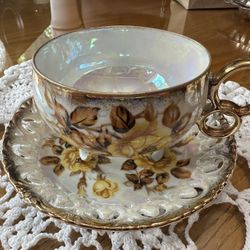 Cup & Saucer Made By Royal Sealy China In Japan. Yellow Roses With Brown Leaves Iridescent With Gold Trim.