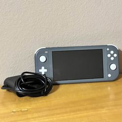 Grey Nintendo Switch Lite + New charger