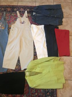 Lot of pants, overalls and jackets. Slightly worn. Pants size 10-12 and 14. Overall size large. Denim jacket extra large.