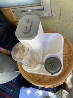 Like new pet food and water dispenser for sale $20