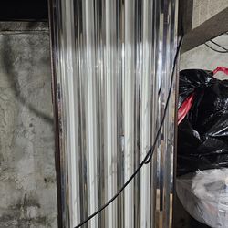 Vegetation hood for growing plants that need high lumens