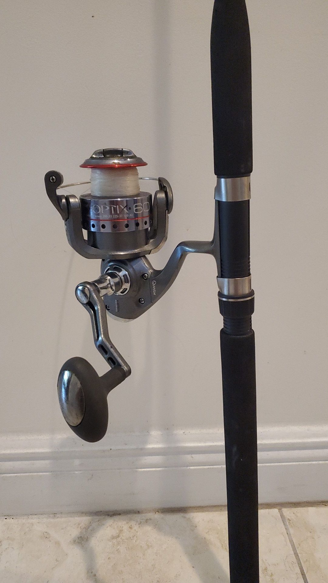 Quantum 60 fishing reel with 7 foot rod pole