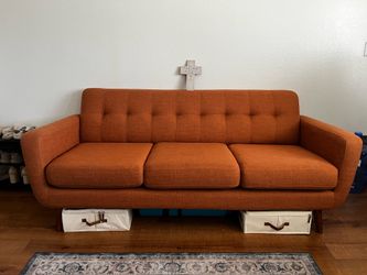 Retro-Modern Aesthetic Orange Couch