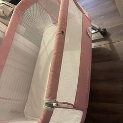 pink bassinet 