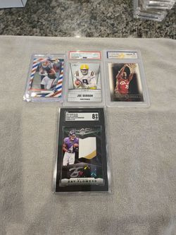 4 cards BR rookie card red whit and blue  Joe Burrow rc graded 10 lebron James rookie card graded 10 zay flowers RPA #25 Graded an 8... which is good 