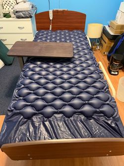 Electric adjustable bed with alternating pressure air mattress