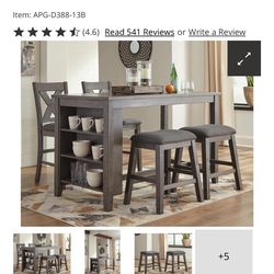 Caitbrook Counter Height Dining Table and 4 Barstools
