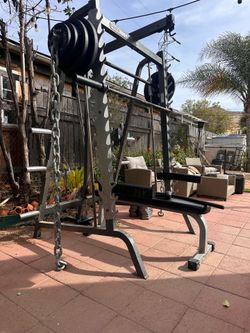 PARABODY OLYMPIC SQUAT RACK SMITH MACHINE WITH OLYMPIC WEIGHTS AND BENCH