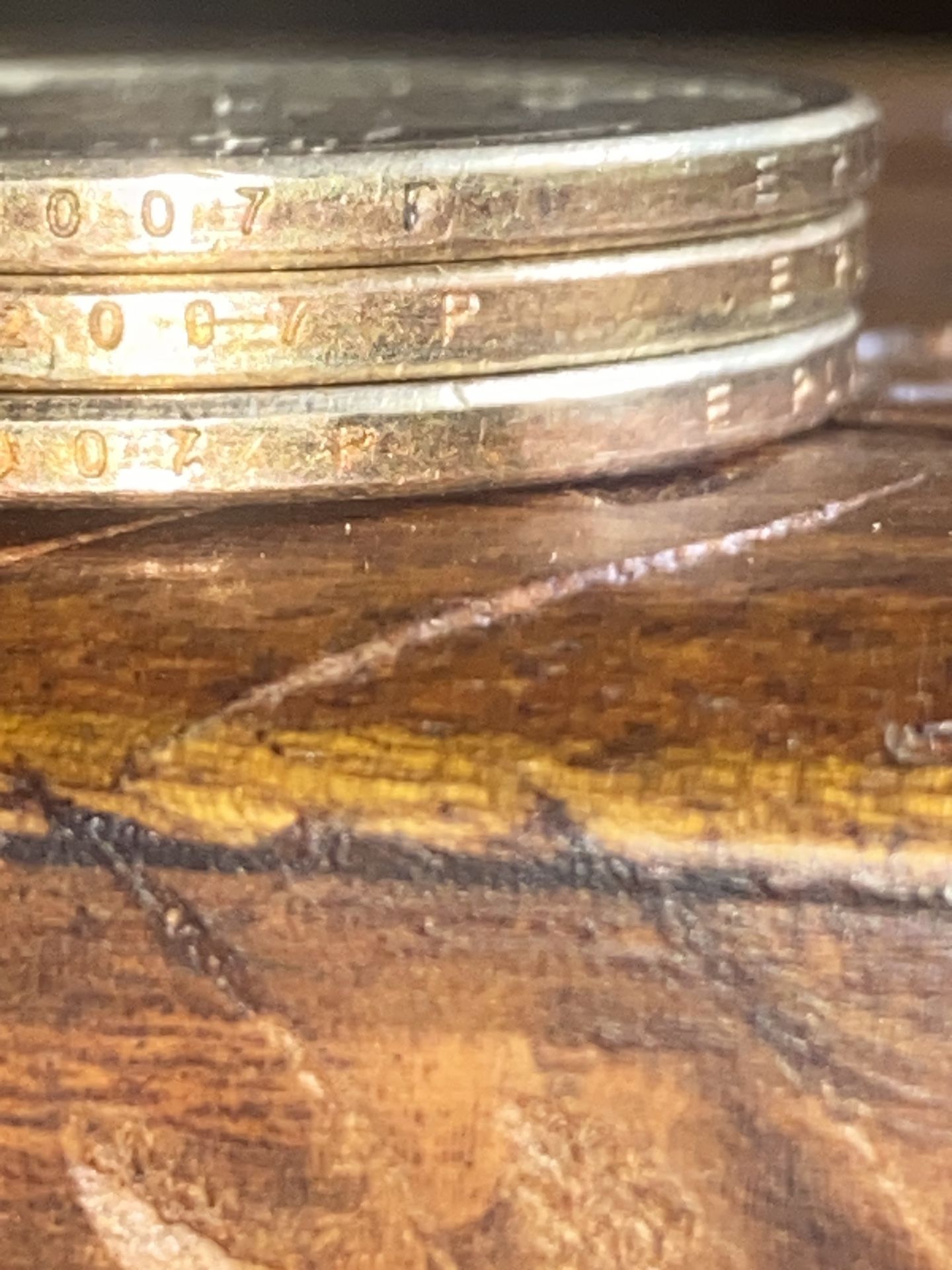 James Madison gold dollar and two George Washington 2007 gold dollar