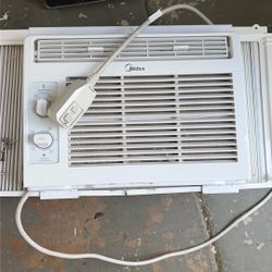 2 Midea 5,000 BTU mechanical window air conditioner
