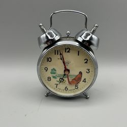 Vintage Shanghai Diamond mechanical twin-bell alarm clock with an animated pecking chicken illustration