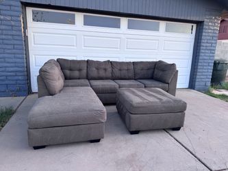 Gray sectional sofa couch sala ottoman.