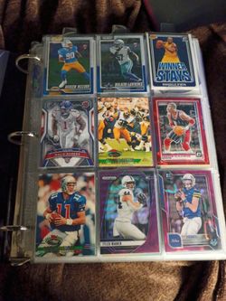 Binder of football and basketball cards
