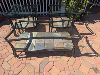Three piece coffee table set and very good condition. It has slight tile on the bottom with rolling grill