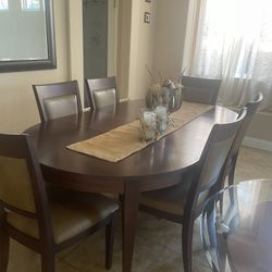 Dining table with six leather chair