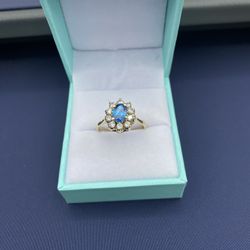 Vintage-Inspired Blue Topaz Halo Ring in 14K Yellow Gold