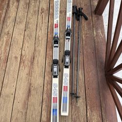 Skis, bindings, boots and poles