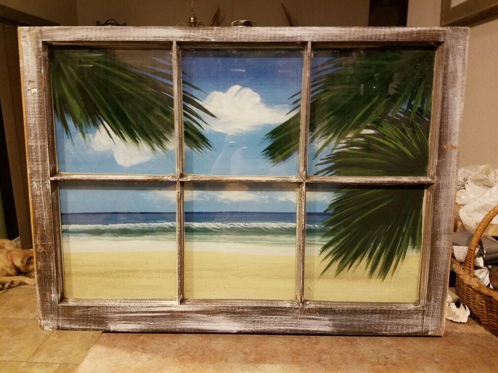 Real window pane with 3D painted ocean scene.