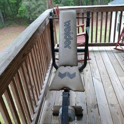 Weight Bench And Some Metal Weights