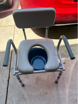 Portable bedside commode chair