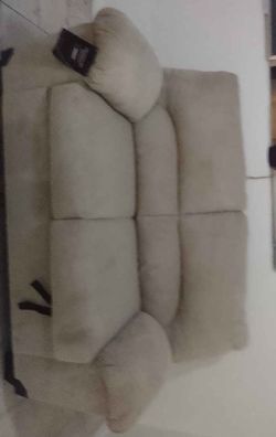 Loveseat sofa , from Ashley furniture, sand color