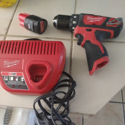 Milwaukee Drill, Charger And Battery 