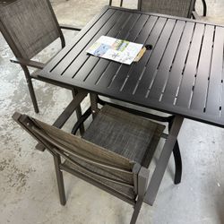 Aluminum Table $100  Chairs $34.99 Each 