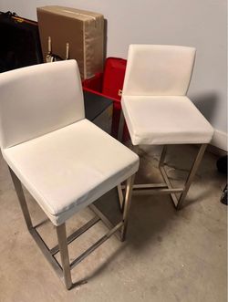 2 white kitchen stools