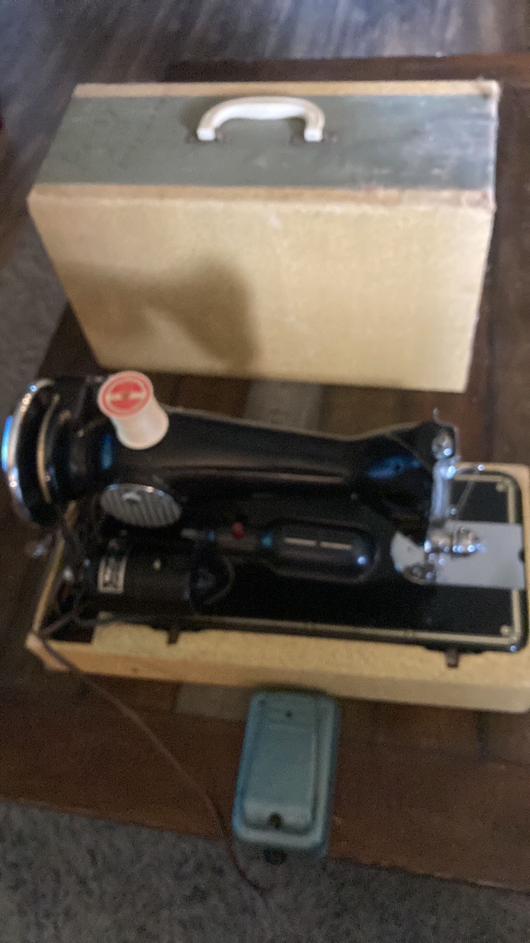 Vintage sewing machine with case