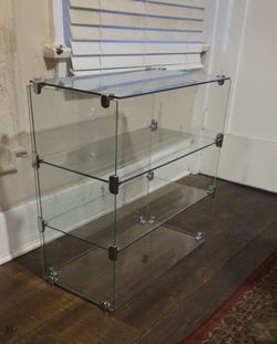 25" x 25" x 13" glass shelving. Excellent Condition.