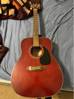 Discontinued Takamine 6 string guitar need gone