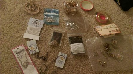 Lots of jewelry making supplies.