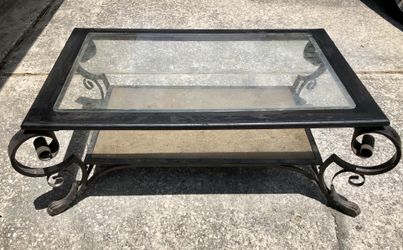 Heavy metal and glass coffee table