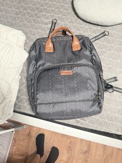 Gray Patterned Backpack with Tan Leather Handles